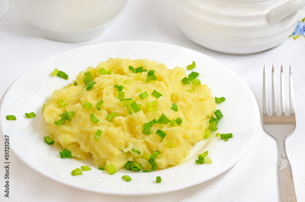 Mashed potatoes on a white plate