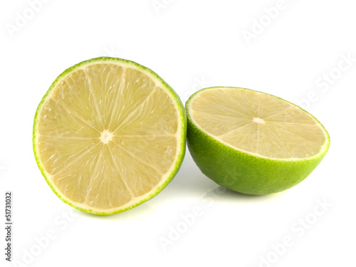 Isolated sliced green lime on a white background