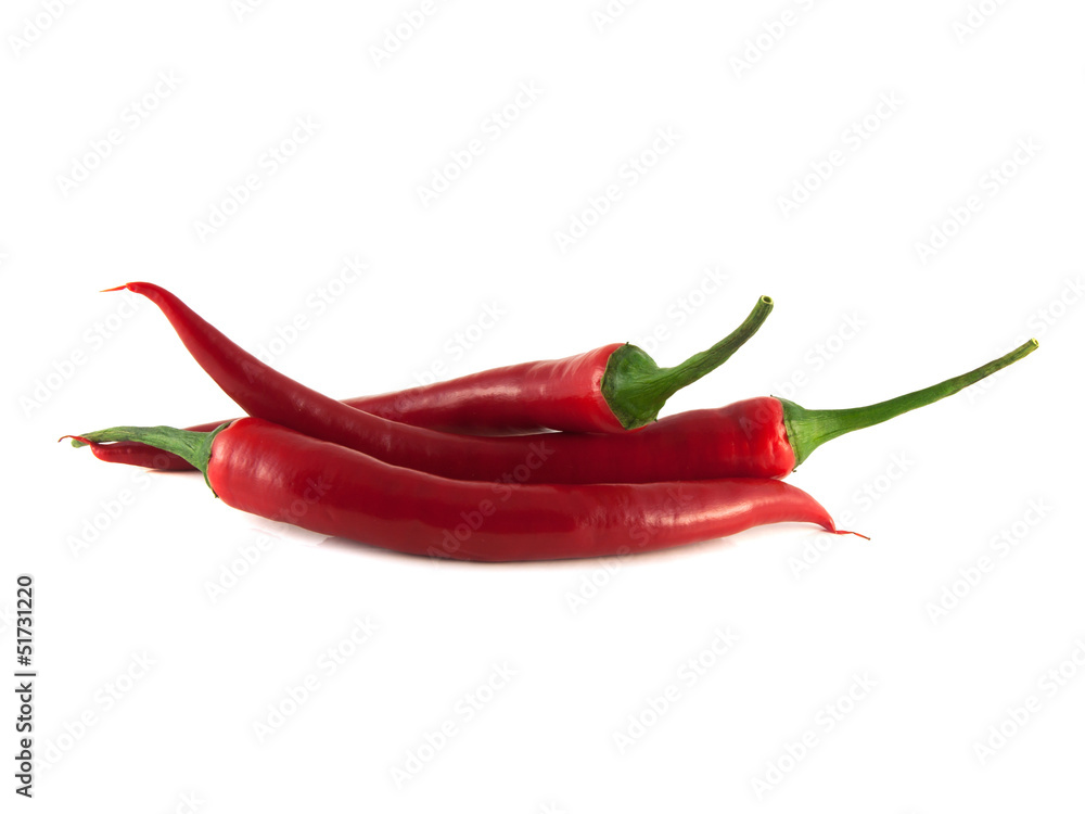 Red chili hot peppers on white background.
