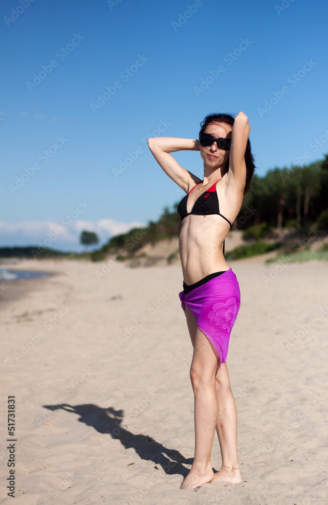 young beautiful woman on the beach young beautiful woman on the beach