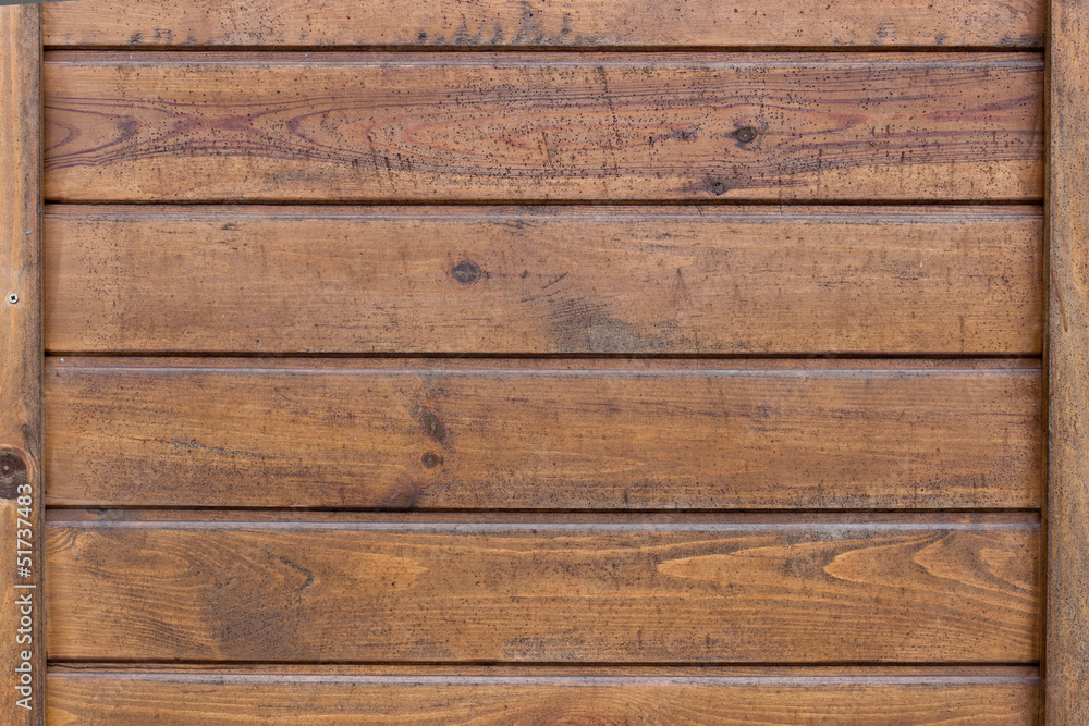 The brown wood texture with natural patterns The brown wood texture with natural patterns