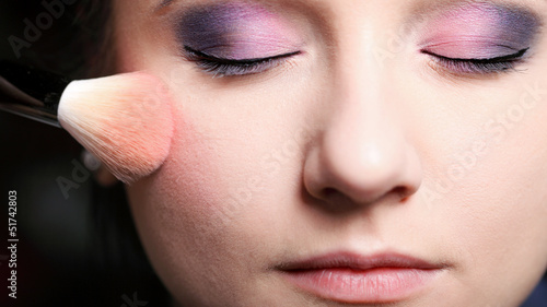 Makeup face applying rouge  blusher