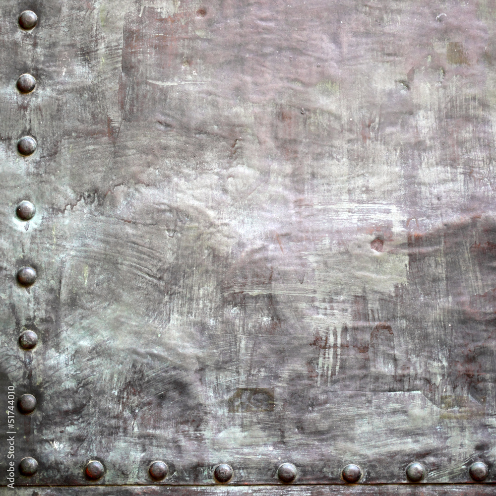 Black metal plate or armour texture with rivets