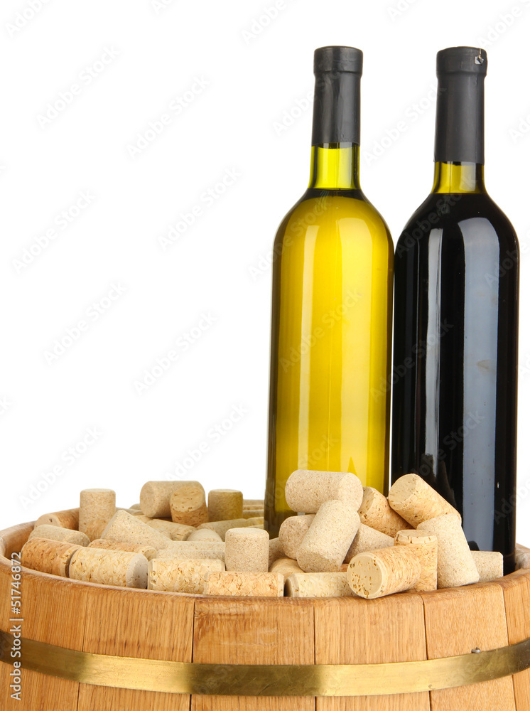 Naklejka premium Wine and corks on barrel isolated on white