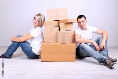 Young couple moving in new house