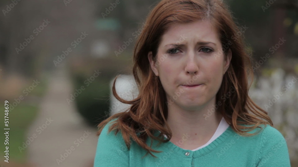 Young woman upset, outside in the cold Young woman upset, outside in the cold