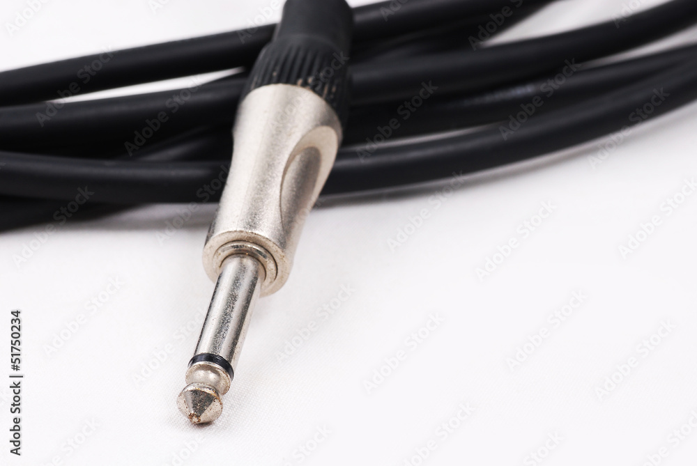 guitar cable audio jack on isolated white background guitar cable audio jack on isolated white background