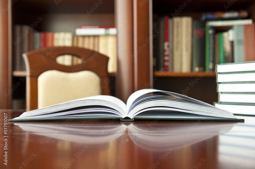 Books on a wooden table Books on a wooden table