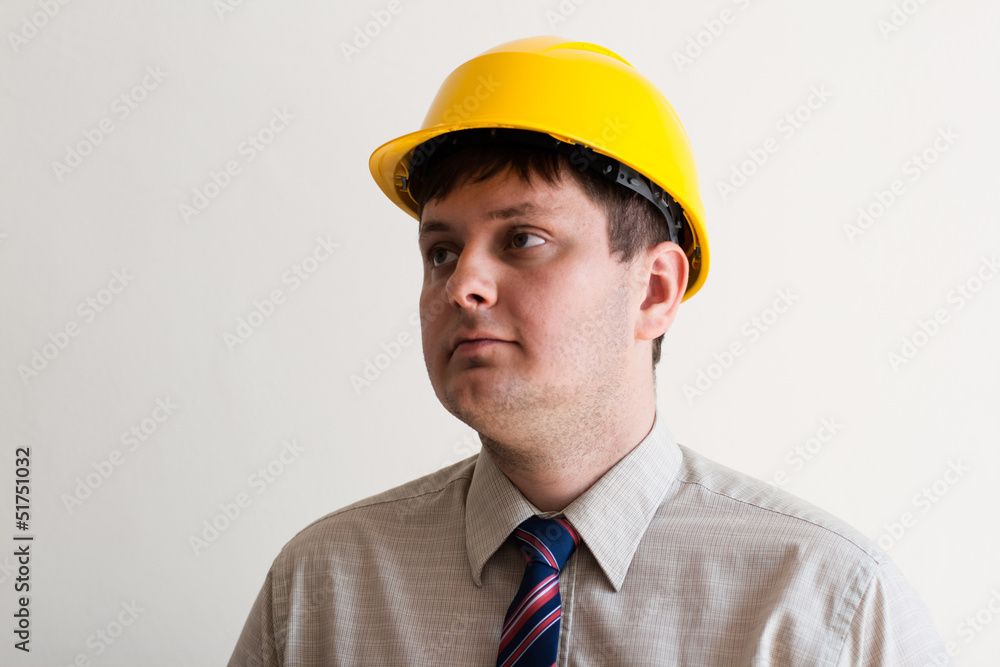 Portrait of a worker in a helmet Portrait of a worker in a helmet