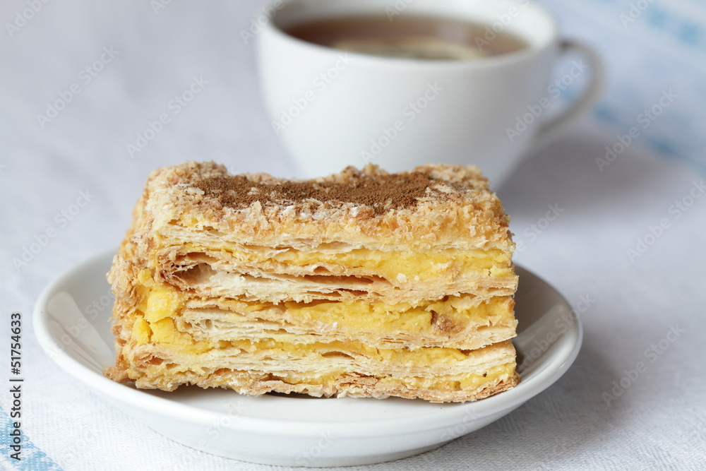 Cake Napoleon and cup of tea Cake Napoleon and cup of tea