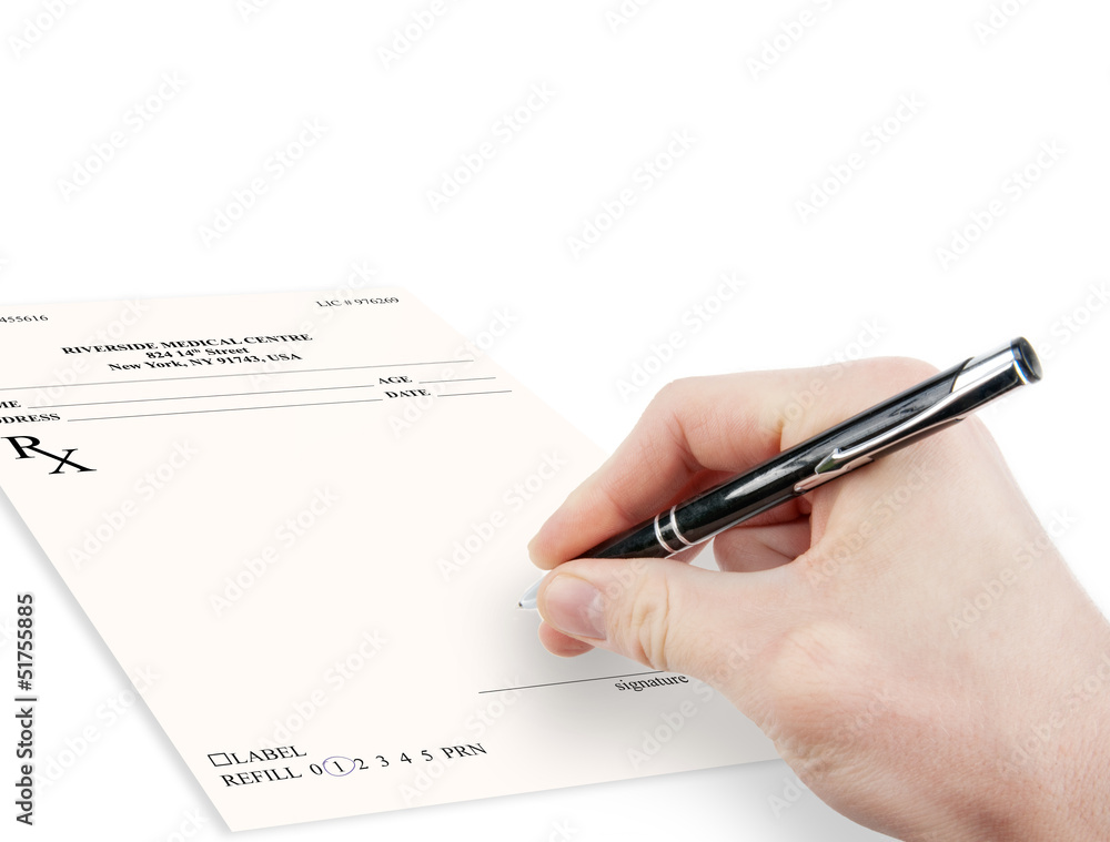 Doctor filling in empty medical prescription isolated Doctor filling in empty medical prescription isolated