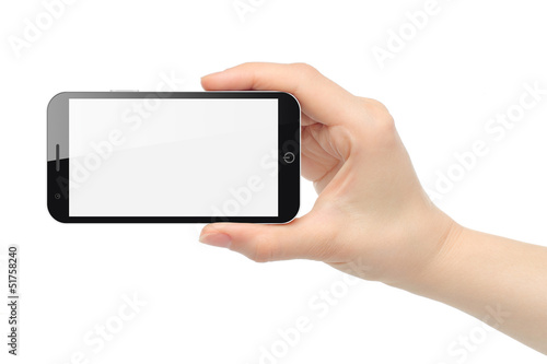 Hand holds smart phone isolated on white background .