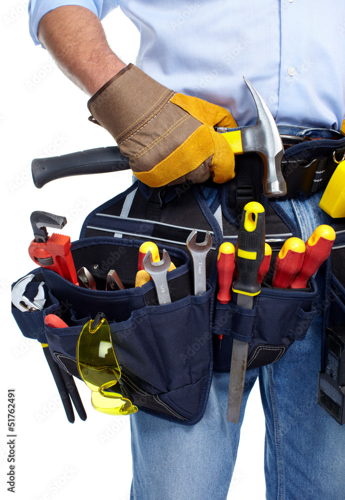 Worker with a tool belt. Worker with a tool belt.
