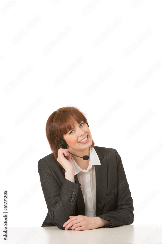 Friendly smiling female call centre operator Friendly smiling female call centre operator