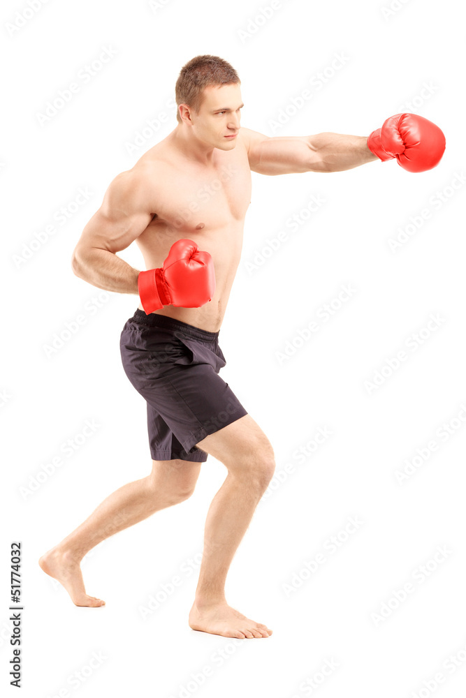 Full length portrait of an athlete with boxing gloves Full length portrait of an athlete with boxing gloves