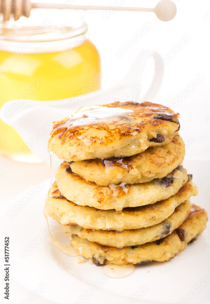 Delightful cheese pancakes on the white Delightful cheese pancakes on the white