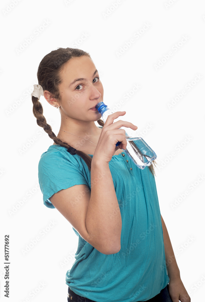 Portrait of the young girl with a water bottle in hands Portrait of the young girl with a water bottle in hands