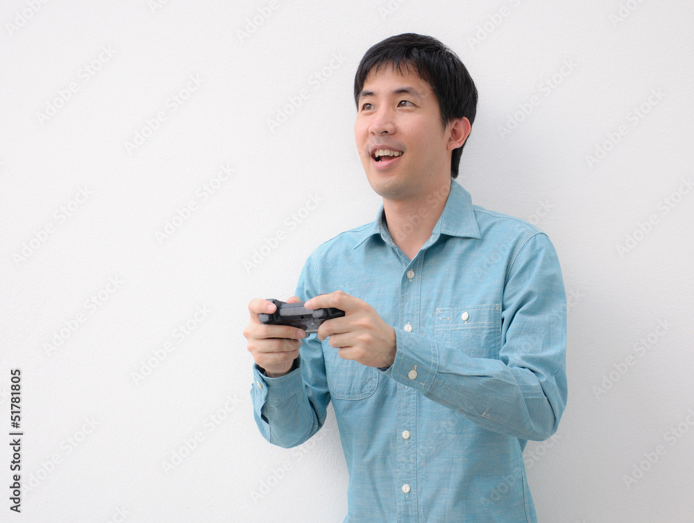 asian man playing video game asian man playing video game