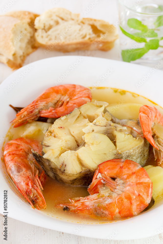 boiled fish with seafood in plate