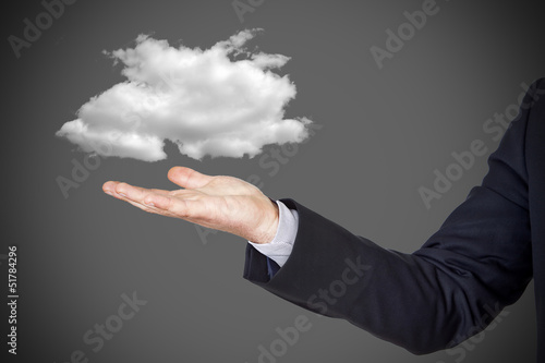 businessman with cloud over hand