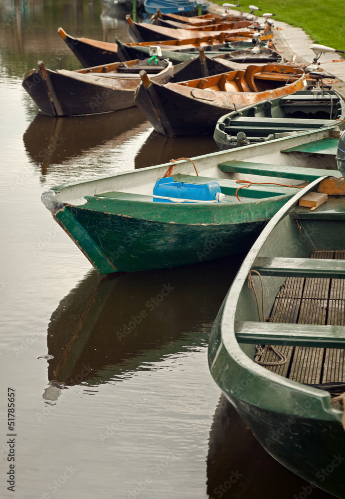 Old Boats Parked in a Canal