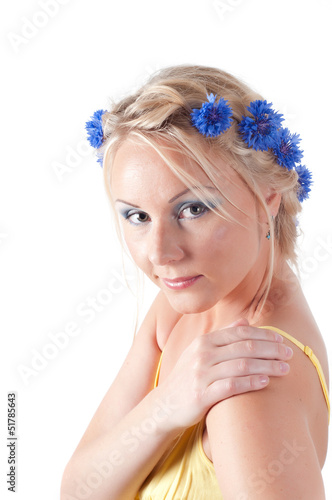 Beautiful woman cornflower watching on you