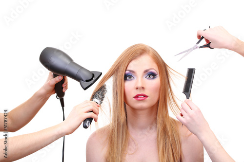 Beautiful woman and hands with brushes, scissors and hairdryer
