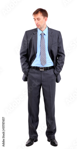 Young businessman isolated on white.