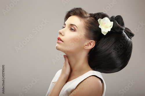 Hairstyle Design. Sensual Woman with Creative Coiffure. Glamor