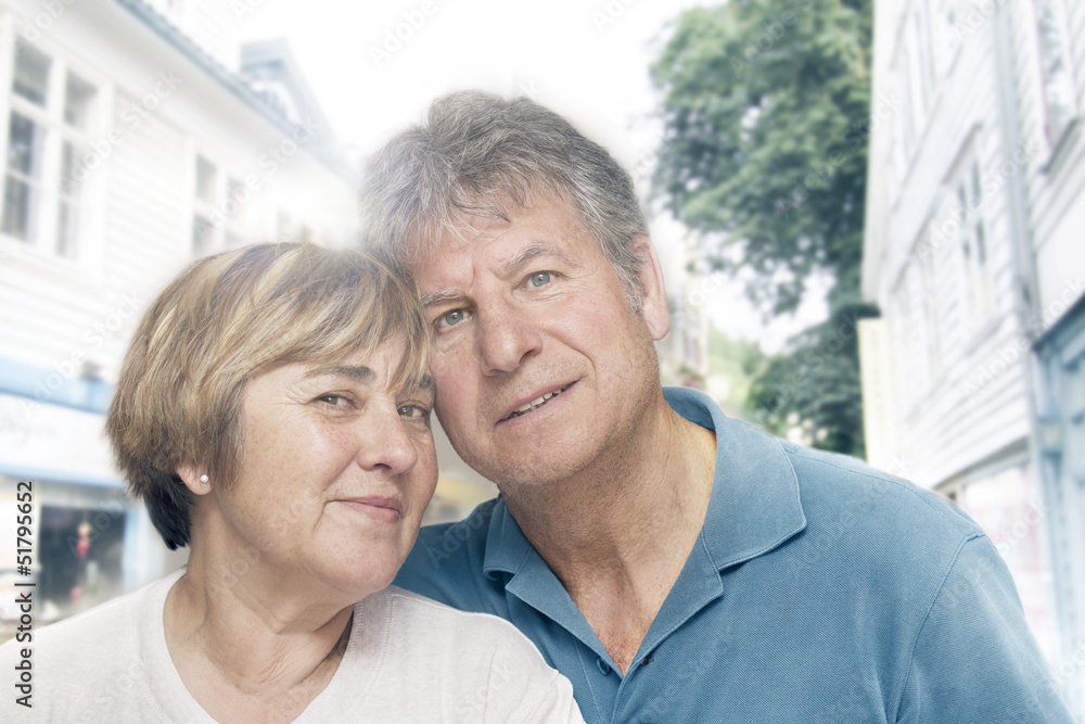 Closeup portrait of happy mature couple enjoying together