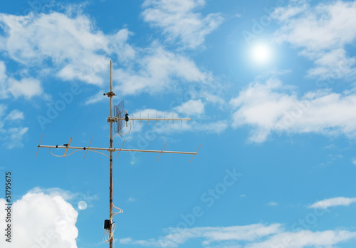 tv antenna and clouds