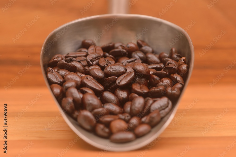 Coffee beans on a scoop Coffee beans on a scoop