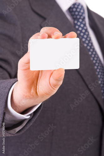 Business man showing blank card.