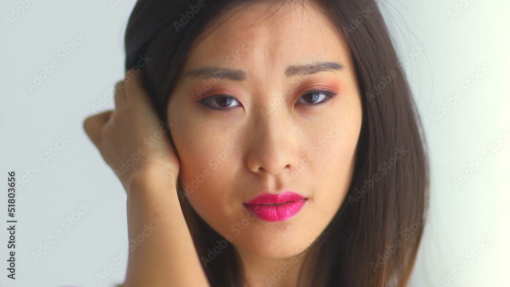 Closeup of sexy Chinese woman looking at camera Closeup of sexy Chinese woman looking at camera