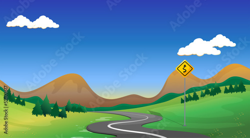 A road with a yellow signage