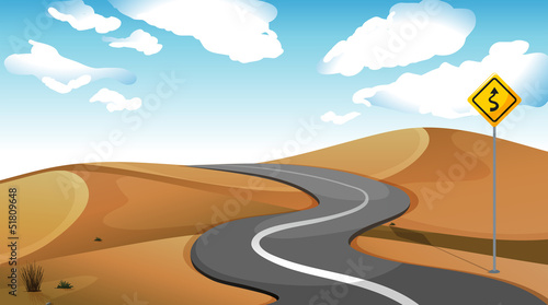 A narrow road at the desert