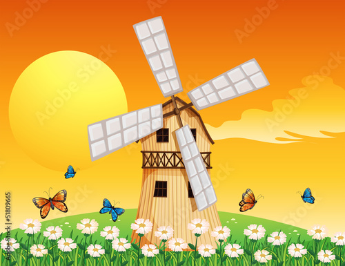 A wooden windmill at the garden