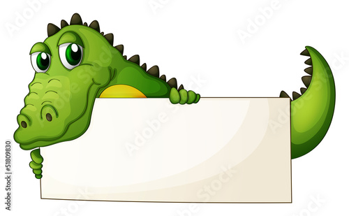 A crocodile holding an empty signage