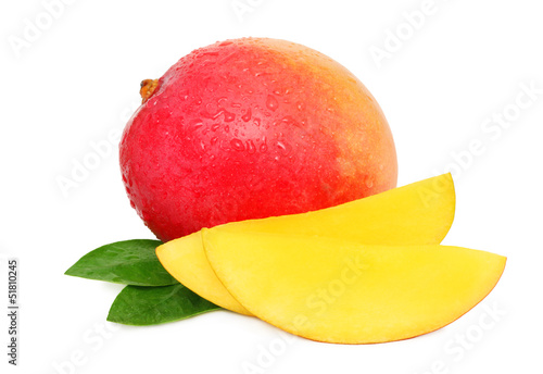 Ripe mango and green leaves with drops (isolated)