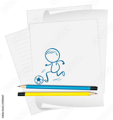 A paper with a drawing of a boy playing soccer