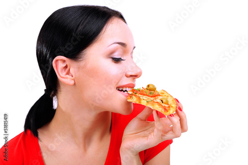 Beautiful girl eats pizza close-up isolated on white