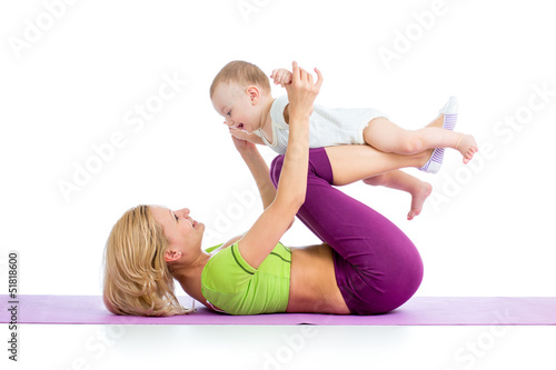 mother with baby doing gymn...
