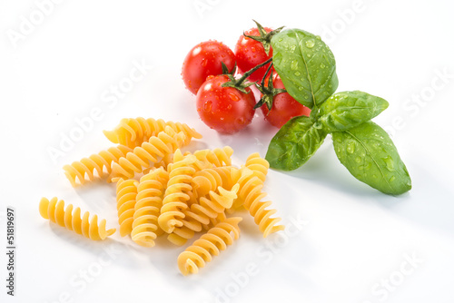 Fusilli, pomodorini e basilico - Italian pasta photo