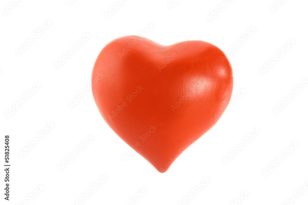 Red heart made of plasticine on a white background