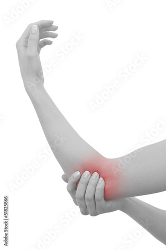 Acute pain in a woman elbow. Female holding hand to spot of elbo © Lovrencg