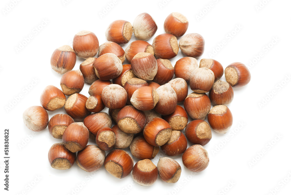 A handful of hazelnuts, isolated