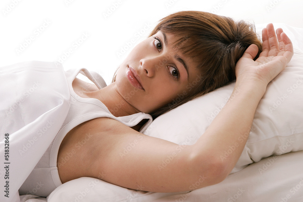 Fototapeta premium Girl thinking in bed