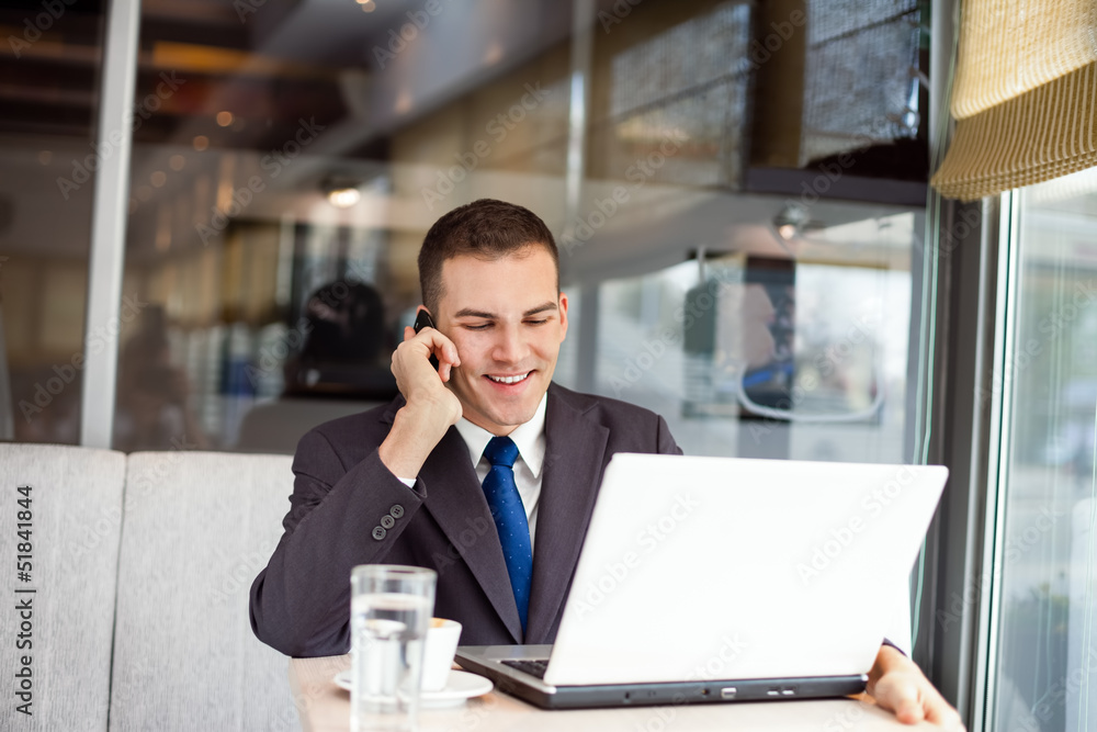 Businessman working in cafe Businessman working in cafe