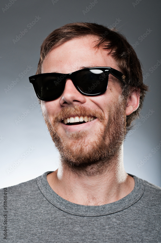 Caucasian Man Wearing Sunglasses And Smiling Caucasian Man Wearing Sunglasses And Smiling