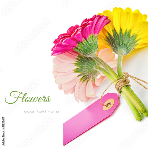 Fototapeta Naklejka Na Ścianę i Meble -  Colorful gerbera flowers with gift tag
